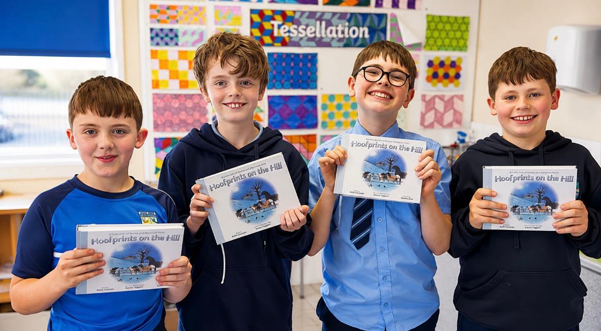 Young readers holding copies of Hoofprints on the Hill